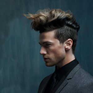 medium length curly quiff hairstyle for men