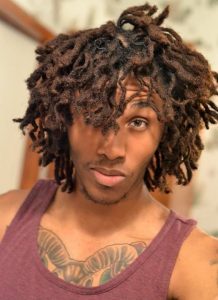 curly dreadlock style with twisted dreads haircuts