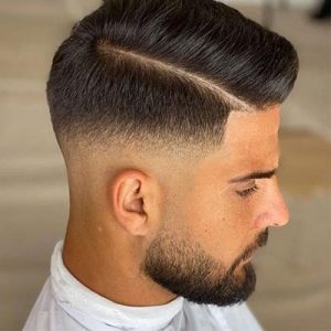 medium low mid fade skin fade haircut for men