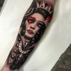black and red queen of hearts tattoo ideas design for arm