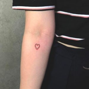 small red heart tattoo design