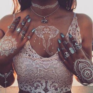 beautiful White Henna Tattoo designs on chest and hand