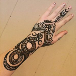 snake mehndi tattoo designs on forearm