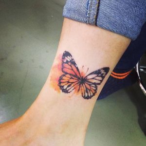 watercolor butterfly tattoo design on leg